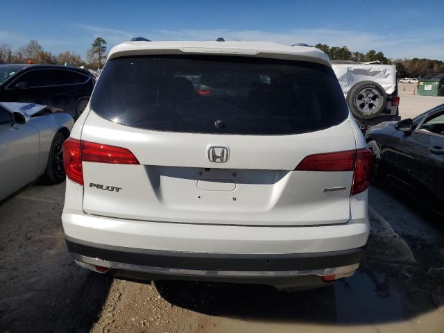 Photo 6 from auction – 2018 HONDA PILOT TOUR with VIN 5FNYF5H9XJB007705