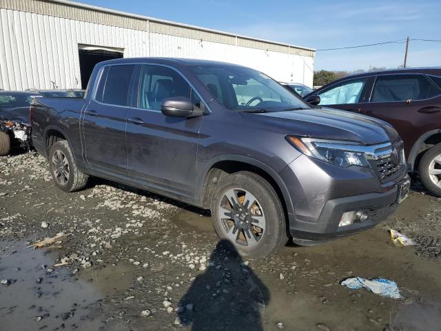 Photo 4 from auction – 2020 HONDA RIDGELINE with VIN 5FPYK3F58LB029583