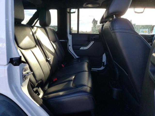 Photo 11 from auction – 2014 JEEP WRANGLER U with VIN 1C4BJWFG9EL279144