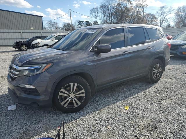 HONDA PILOT EXL 2018 with VIN 5FNYF5H51JB019965 - Photo from auction