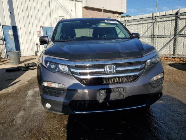 Photo 5 from auction – 2017 HONDA PILOT TOUR with VIN 5FNYF5H97HB044799