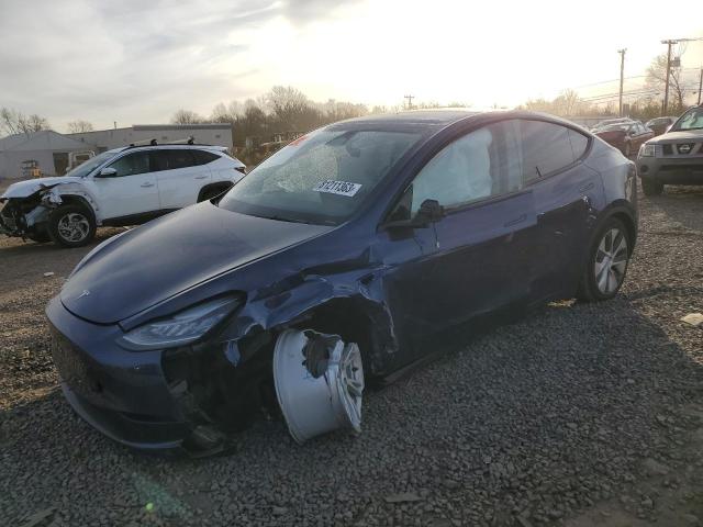 TESLA MODEL Y 2023 with VIN 7SAYGDEE6PA029699 - Photo from auction