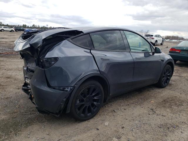 Photo 3 from auction – 2023 TESLA MODEL Y with VIN 7SAYGDEE7PF857196