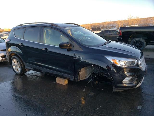 Photo 4 from auction – 2018 FORD ESCAPE SE with VIN 1FMCU9GD6JUB62137