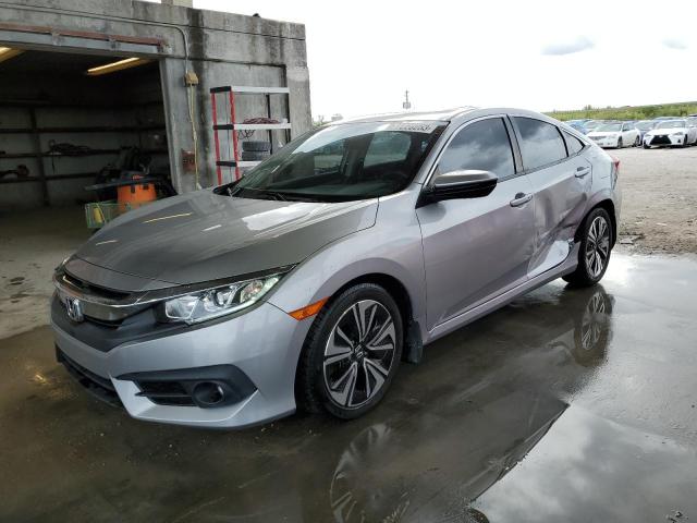 Photo 1 from auction – 2018 HONDA CIVIC EX with VIN JHMFC1F35JX011558