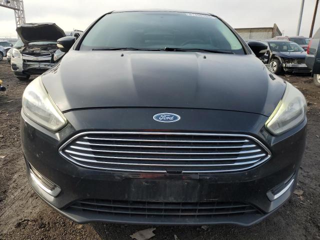 Photo 5 from auction – 2016 FORD FOCUS TITA with VIN 1FADP3J24GL305384