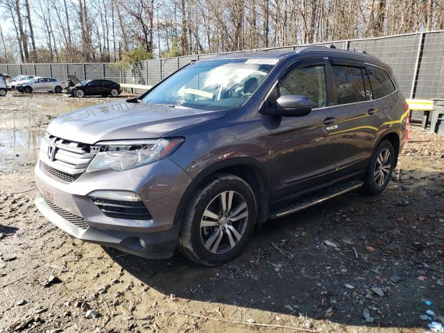 HONDA PILOT EXLN 2016 with VIN 5FNYF5H77GB018555 - Photo from auction