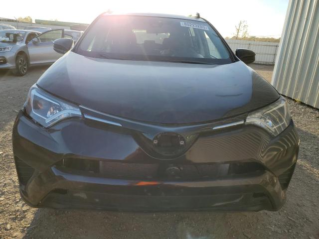 Photo 5 from auction – 2018 TOYOTA RAV4 LE with VIN 2T3BFREV2JW712524