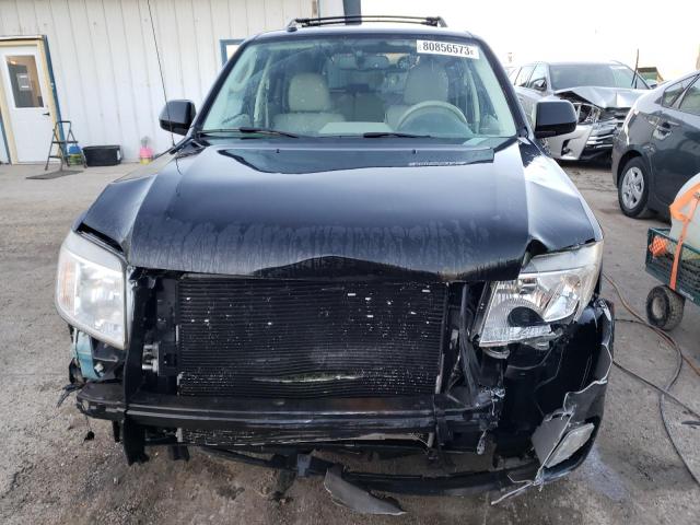 Photo 5 from auction – 2011 MERCURY MARINER PR with VIN 4M2CN9HG7BKJ08234