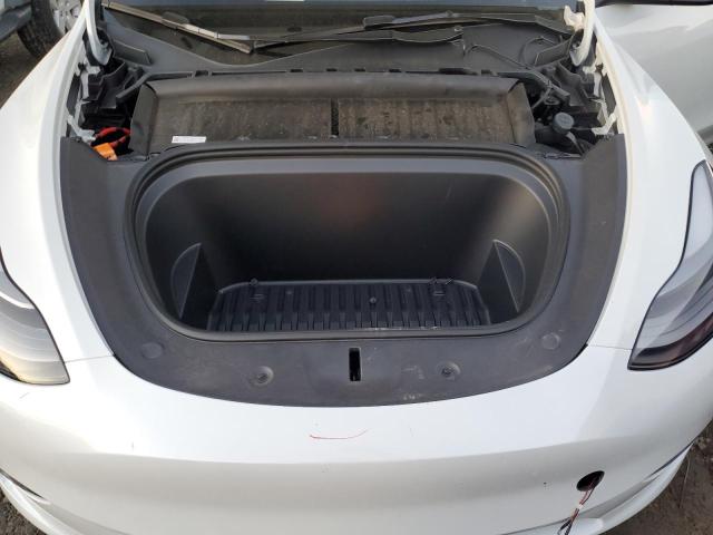 Photo 11 from auction – 2023 TESLA MODEL Y with VIN 7SAYGDEE6PF748499