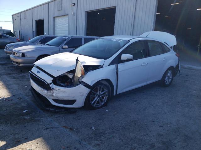 FORD FOCUS SE 2015 with VIN 1FADP3F26FL271195 - Photo from auction
