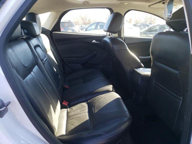 Foto 10 de la subasta – 2013 FORD FOCUS SE con VIN 1FADP3K29DL214542