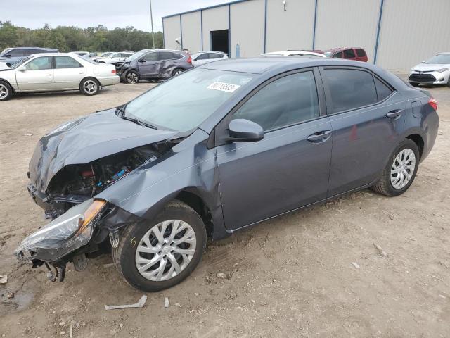 TOYOTA COROLLA L 2018 with VIN 5YFBURHE6JP810242 - Photo from auction