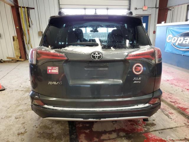 Photo 6 from auction – 2017 TOYOTA RAV4 XLE with VIN JTMRFREV0HJ119980