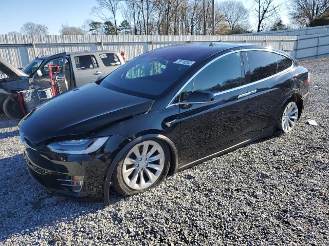 TESLA MODEL X 2018 with VIN 5YJXCAE21JF134945 - Photo from auction
