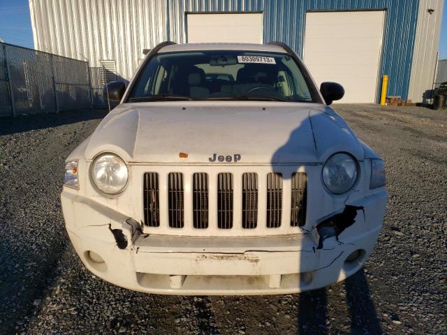 Photo 5 from auction – 2010 JEEP COMPASS SP with VIN 1J4NT4FB7AD514784
