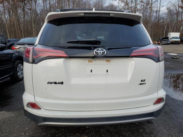 Photo 6 from auction – 2016 TOYOTA RAV4 SE with VIN JTMJFREV9GJ074629