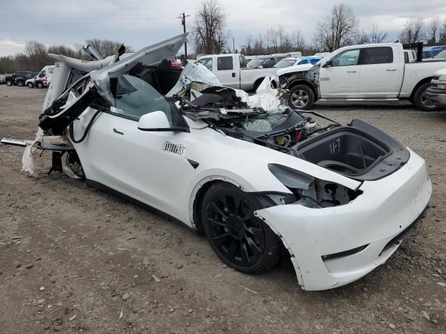 Photo 4 from auction – 2022 TESLA MODEL Y with VIN 7SAYGDEE1NF481284