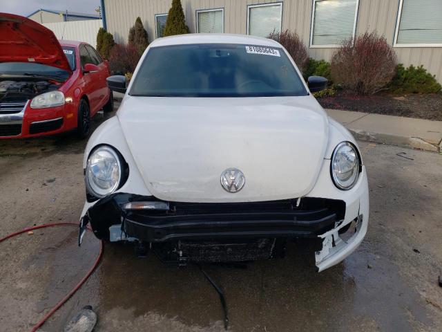 Photo 5 from auction – 2014 VOLKSWAGEN BEETLE with VIN 3VWFP7AT1EM603029