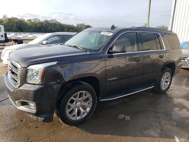 GMC YUKON SLE 2017 with VIN 1GKS1AKC9HR111760 - Photo from auction