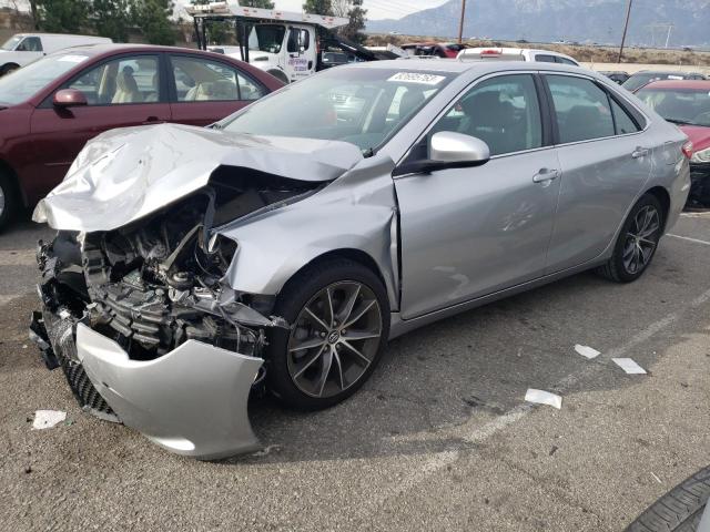 TOYOTA CAMRY LE 2017 with VIN 4T1BF1FK3HU299005 - Photo from auction