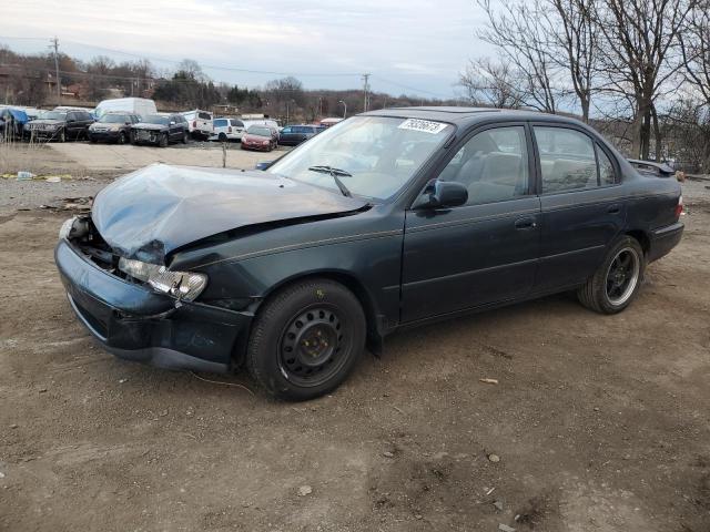TOYOTA COROLLA DX 1997 with VIN 1NXBB02E6VZ605518 - Photo from auction