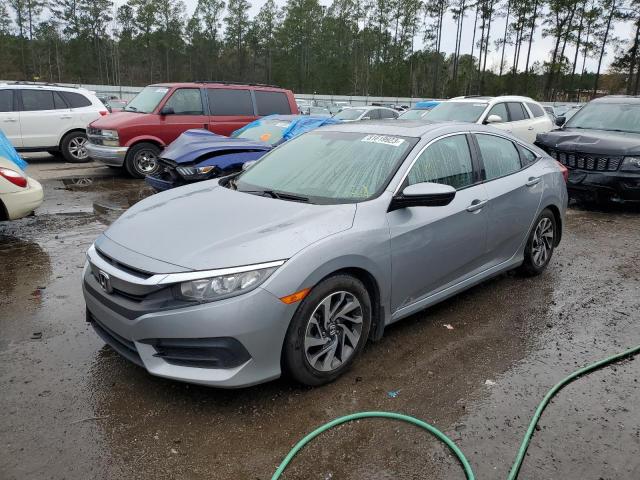 HONDA CIVIC EX 2018 with VIN 2HGFC2F71JH513984 - Photo from auction