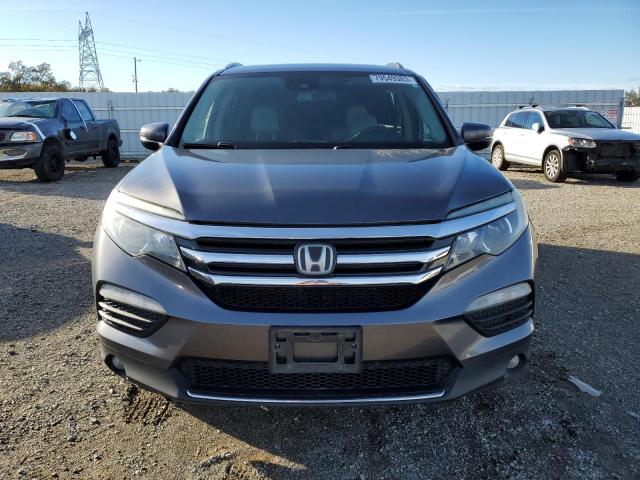 Photo 5 from auction – 2017 HONDA PILOT ELIT with VIN 5FNYF6H04HB054603