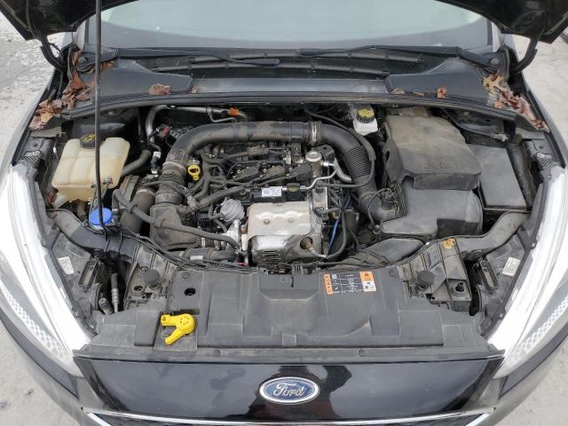 Photo 11 from auction – 2018 FORD FOCUS SE with VIN 1FADP3FEXJL282980