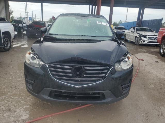 Photo 5 from auction – 2016 MAZDA CX-5 SPORT with VIN JM3KE2BEXG0618202