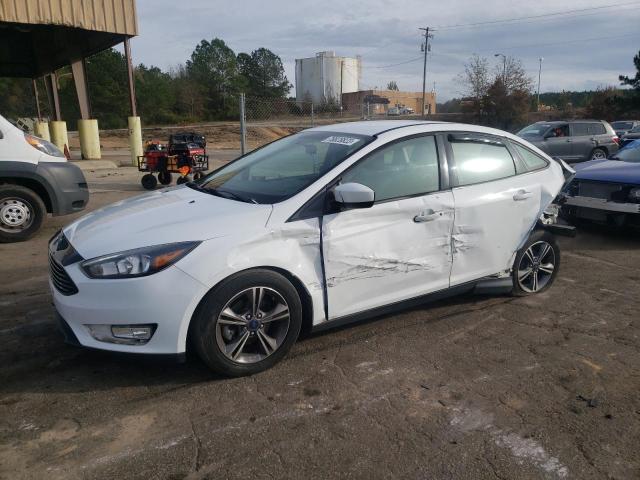FORD FOCUS SE 2018 with VIN 1FADP3F24JL255408 - Photo from auction