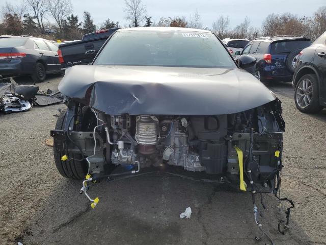 Photo 5 from auction – 2023 HONDA CIVIC SPOR with VIN 2HGFE2F50PH509491
