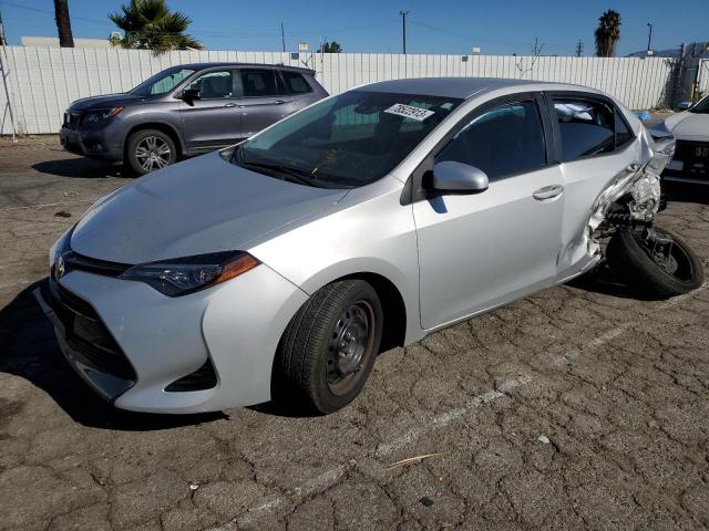 TOYOTA COROLLA L 2017 with VIN 5YFBURHE5HP664801 - Photo from auction