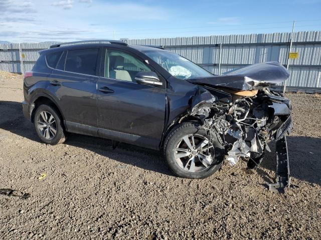 Photo 4 from auction – 2017 TOYOTA RAV4 XLE with VIN JTMRFREVXHD216263