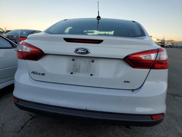 Foto 6 de la subasta – 2013 FORD FOCUS SE con VIN 1FADP3F25DL252022