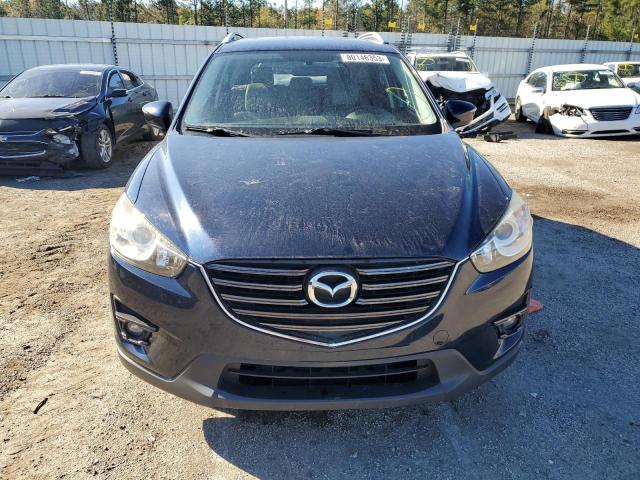 Photo 5 from auction – 2016 MAZDA CX-5 TOURI with VIN JM3KE2CY0G0677350