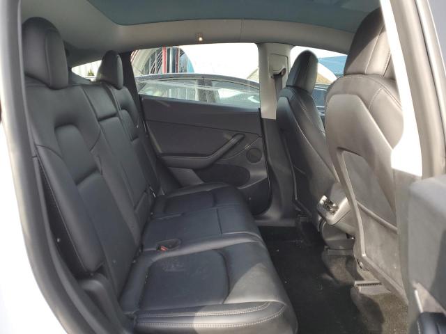 Photo 11 from auction – 2023 TESLA MODEL Y with VIN 7SAYGAEE7PF671446