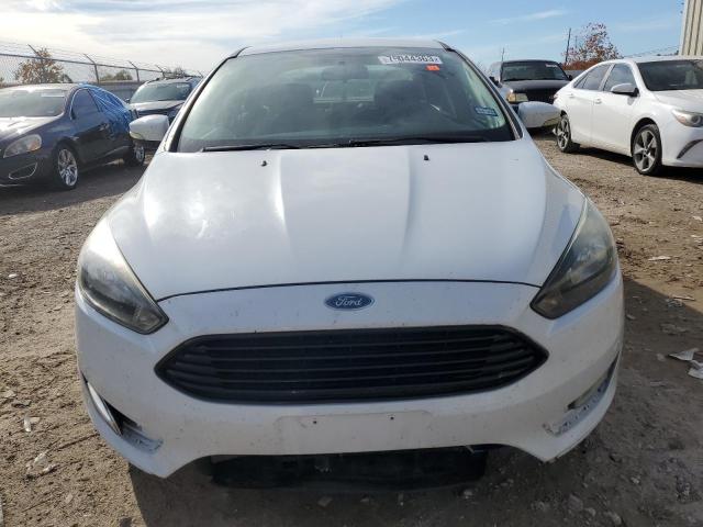 Photo 5 from auction – 2017 FORD FOCUS SE with VIN 1FADP3FE3HL290039