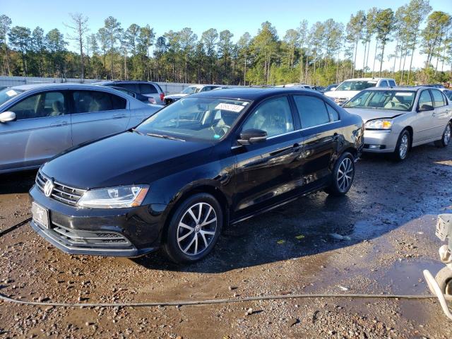 VOLKSWAGEN JETTA SE 2018 with VIN 3VWDB7AJ5JM263771 - Photo from auction
