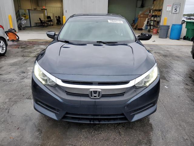 Photo 5 from auction – 2018 HONDA CIVIC LX with VIN 19XFC2F58JE023728