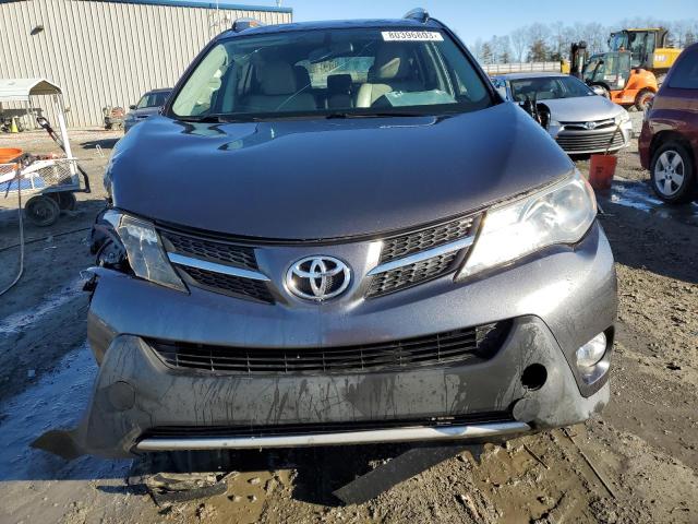 Photo 5 from auction – 2014 TOYOTA RAV4 XLE with VIN JTMWFREV3EJ015062