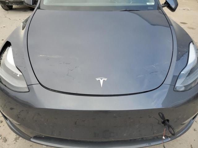 Photo 11 from auction – 2023 TESLA MODEL Y with VIN 7SAYGDEE5PF747229