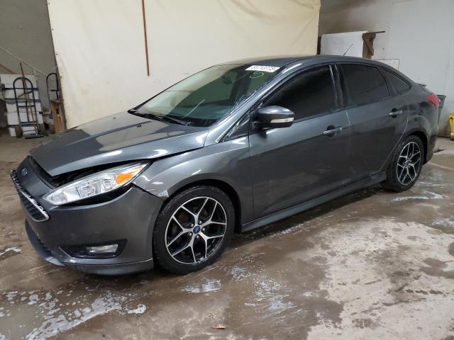 FORD FOCUS SE 2015 with VIN 1FADP3F27FL266166 - Photo from auction