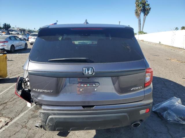 Photo 6 from auction – 2021 HONDA PASSPORT E with VIN 5FNYF8H50MB024662