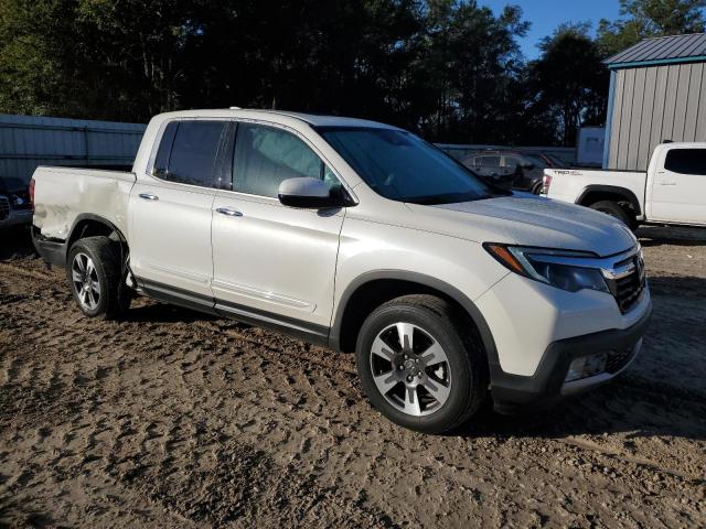 Photo 4 from auction – 2017 HONDA RIDGELINE with VIN 5FPYK3F76HB010782