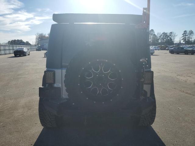 Photo 6 from auction – 2016 JEEP WRANGLER U with VIN 1C4BJWDG2GL106278