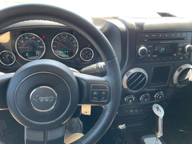 Photo 9 from auction – 2014 JEEP WRANGLER U with VIN 1C4BJWDG9EL130719