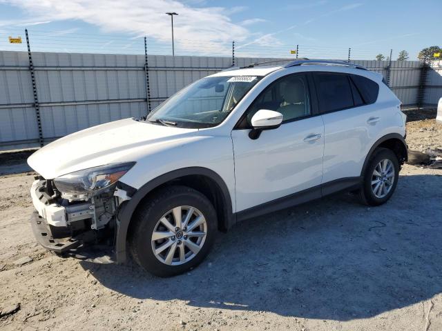 MAZDA CX-5 TOURI 2016 with VIN JM3KE2CY1G0859400 - Photo from auction