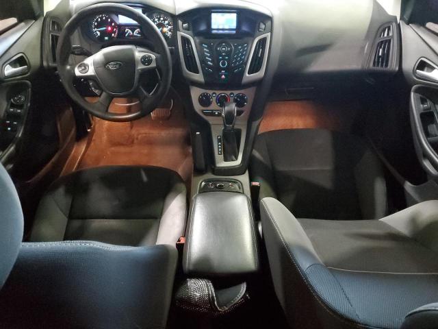 Photo 8 from auction – 2014 FORD FOCUS SE with VIN 1FADP3F21EL174789