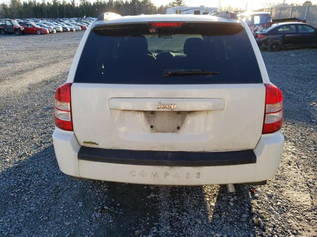 Photo 6 from auction – 2010 JEEP COMPASS SP with VIN 1J4NT4FB7AD514784